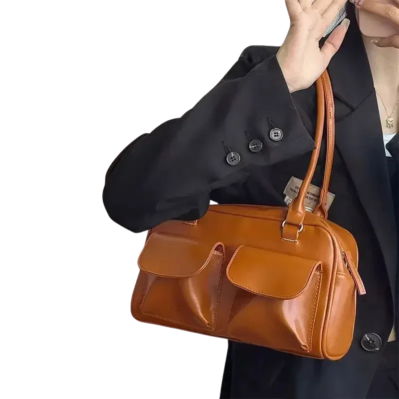 Maeve – Multi-pocket handbag with zip closure and single shoulder strap