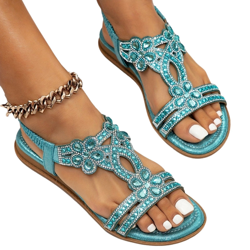 Amira – T Strap Sandals with Floral Accents and Rhinestone Details