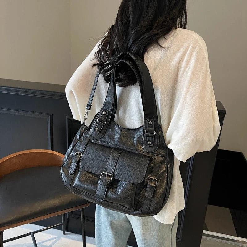 Reagan - Handbag with adjustable shoulder strap and multiple compartments