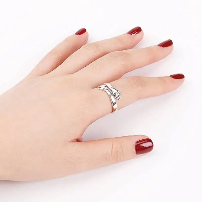 Elena – Adjustable Open Ring with Interlocking Hands Design