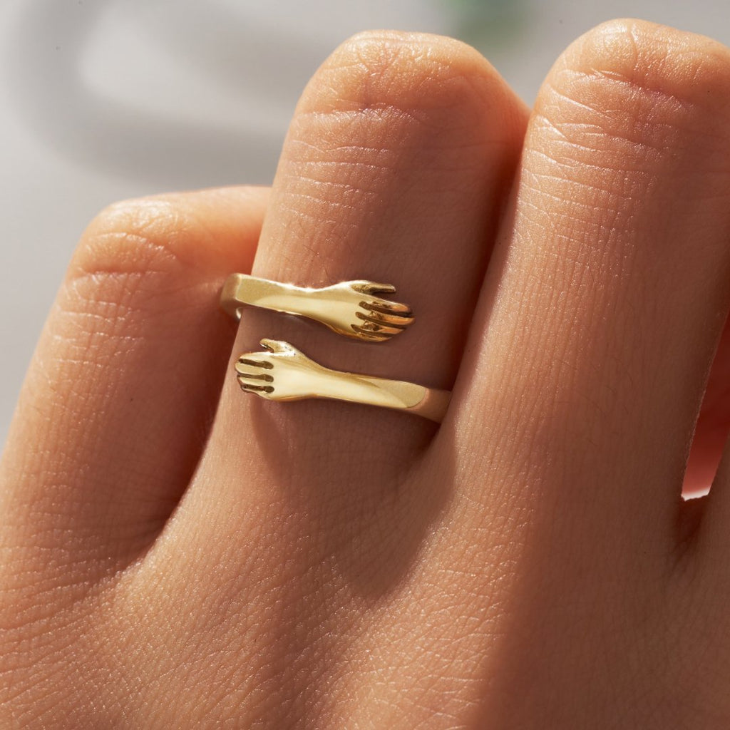 Elena – Adjustable Open Ring with Interlocking Hands Design
